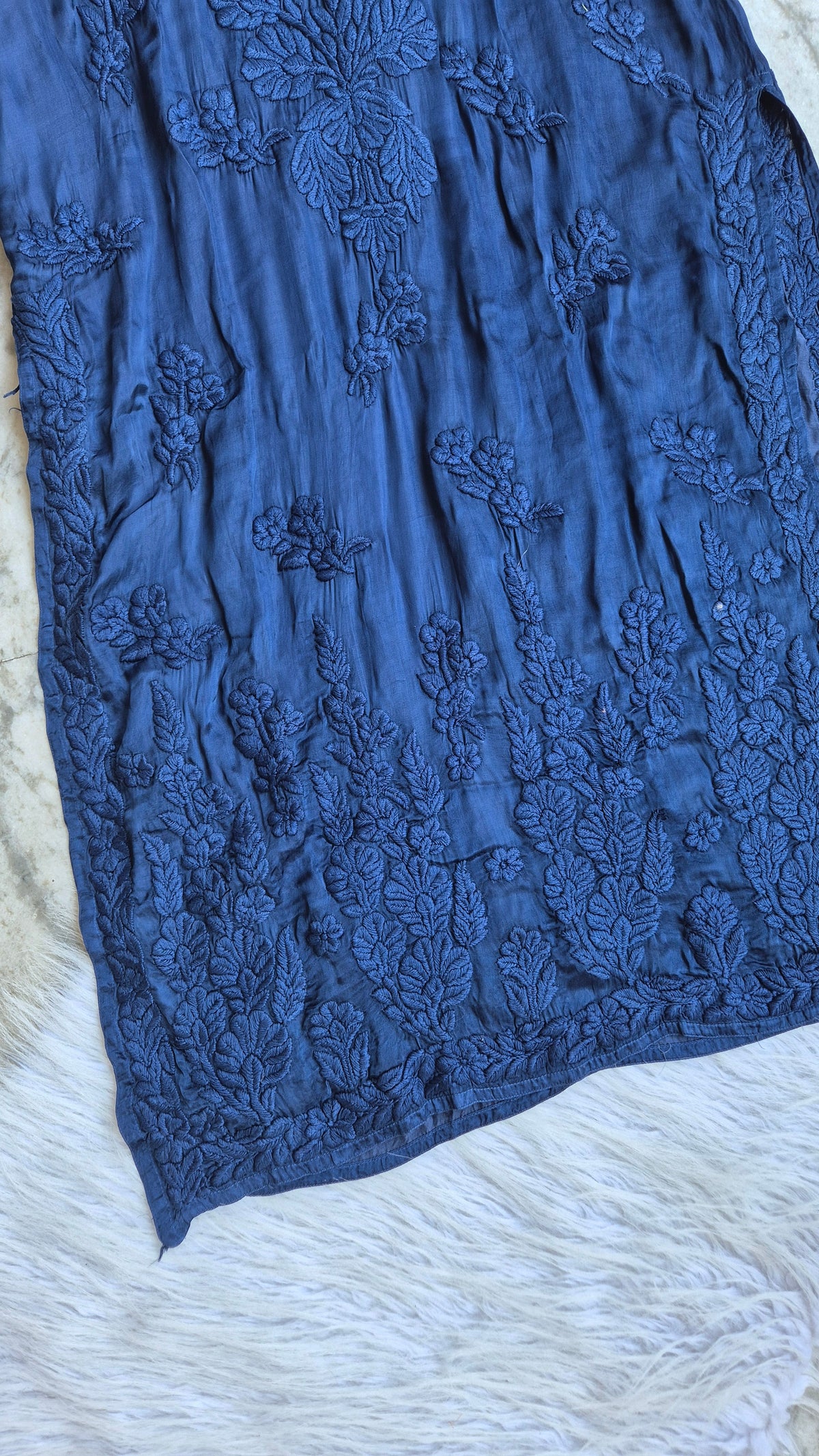 Luxurious metallic blue handcrafted Chikankari long kurta with pockets, from LVW Fashions, showcasing intricate Lucknow embroidery.