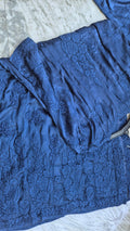 Luxurious metallic blue handcrafted Chikankari long kurta with pockets by LVW Fashions, featuring intricate Lucknow embroidery.