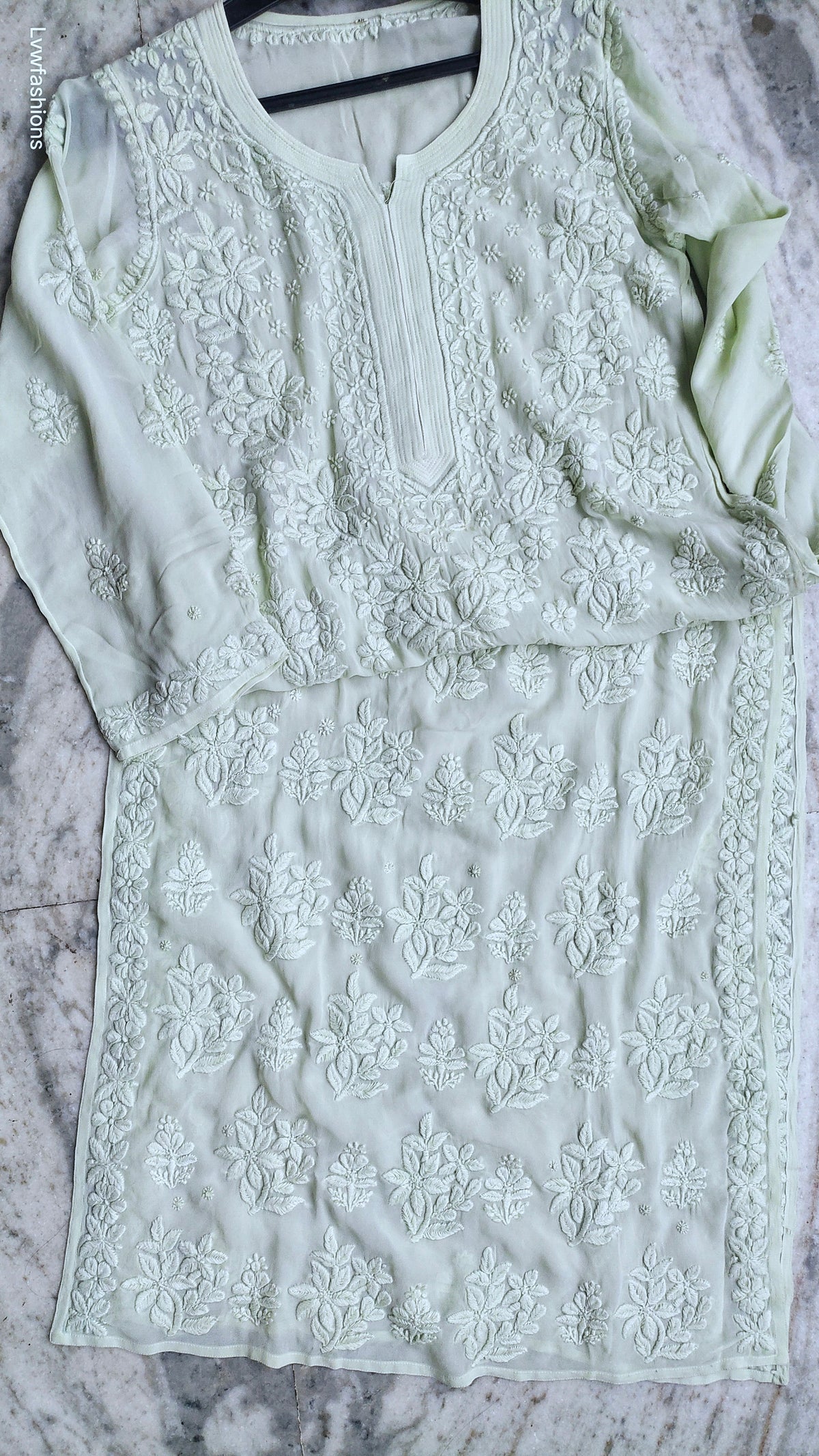 A Pista Green Adaya Morning Kurta by LVW Fashions, handmade Chikankari with luxurious georgette fabric and intricate embroidery.