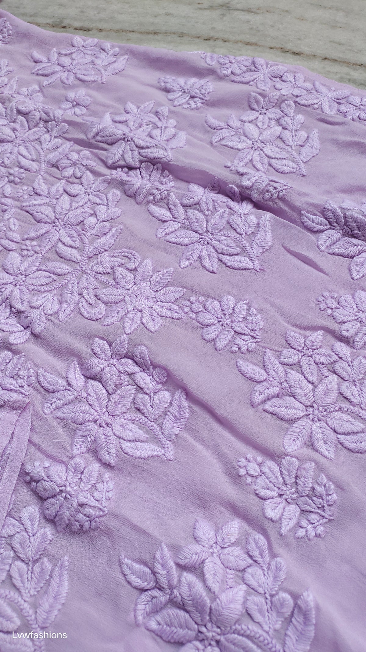 Handmade lavender Adaya Powder Chikankari kurta by LVW Fashions, featuring traditional Lucknow embroidery.