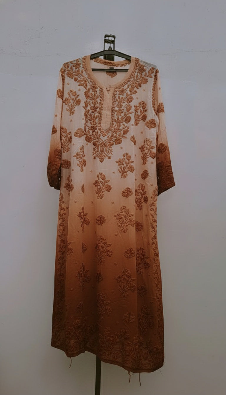 A beige Adaya premium georgette long kurta with intricate Lucknow chikankari embroidery, featuring neck and daman embroidered details.