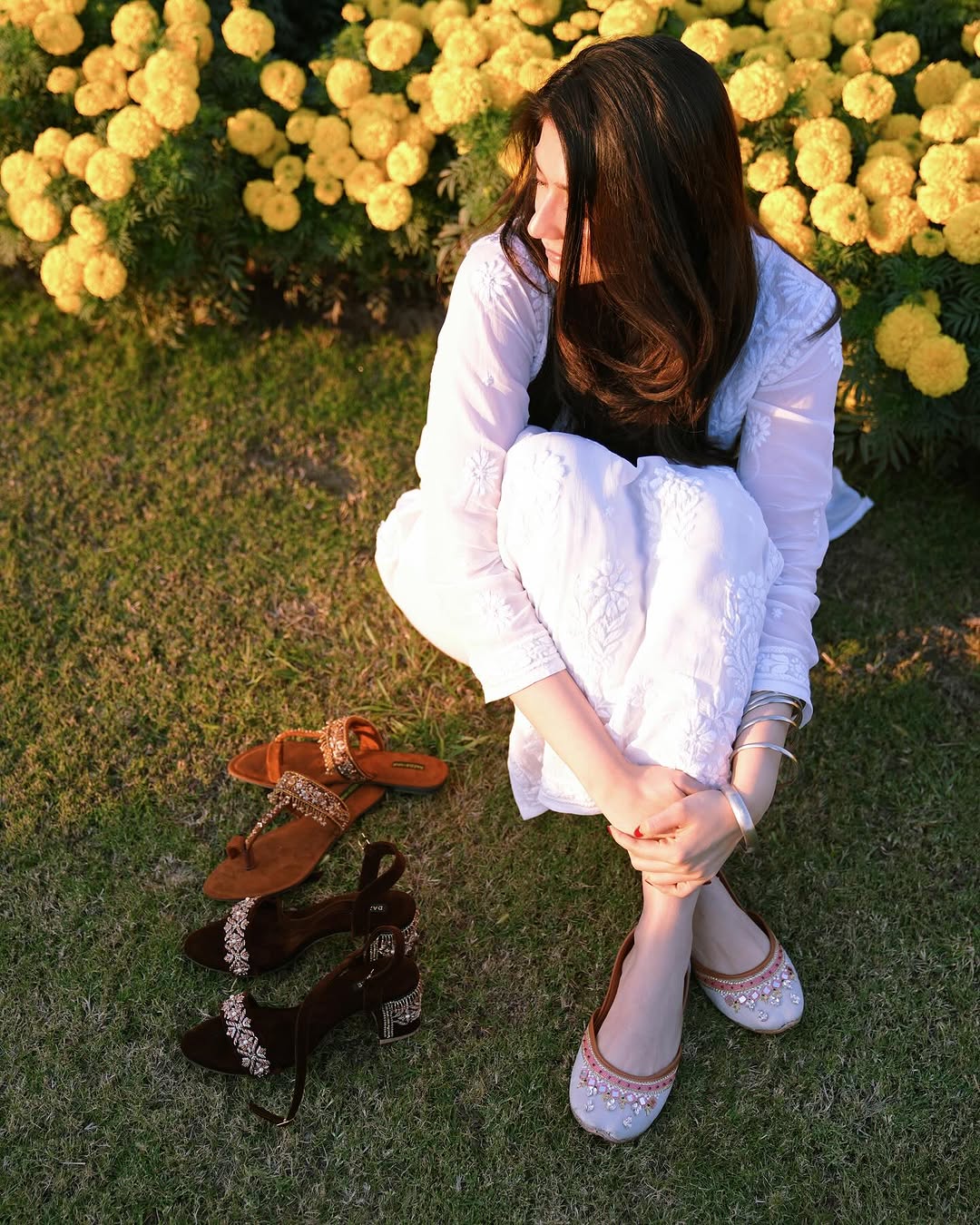 A white premium georgette Chikankari kurta from LVW Fashions, showcasing intricate handmade Lucknow embroidery.