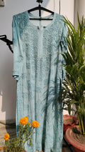 Aqua blue long georgette Chikankari kurta by LVW Fashions, featuring intricate handmade Lucknow embroidery and a luxurious look.