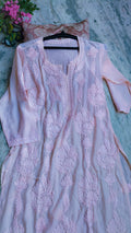 Baby pink silk long kurta with intricate Lucknow chikankari embroidery by LVW Fashions, featuring delicate floral lotus designs.