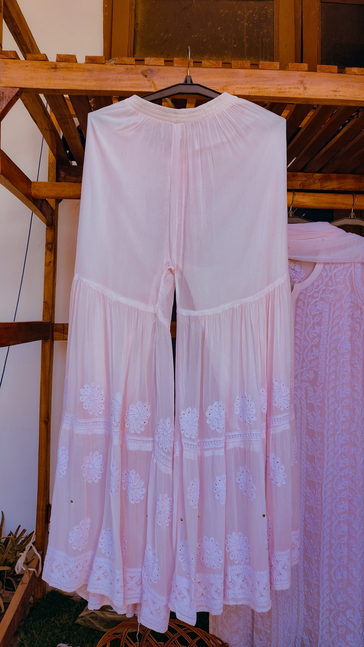 Baby pink Noori full jaal pearl cutdana chikankari embroidery long kurta by LVW Fashions, handcrafted with intricate Lucknow chikankari.