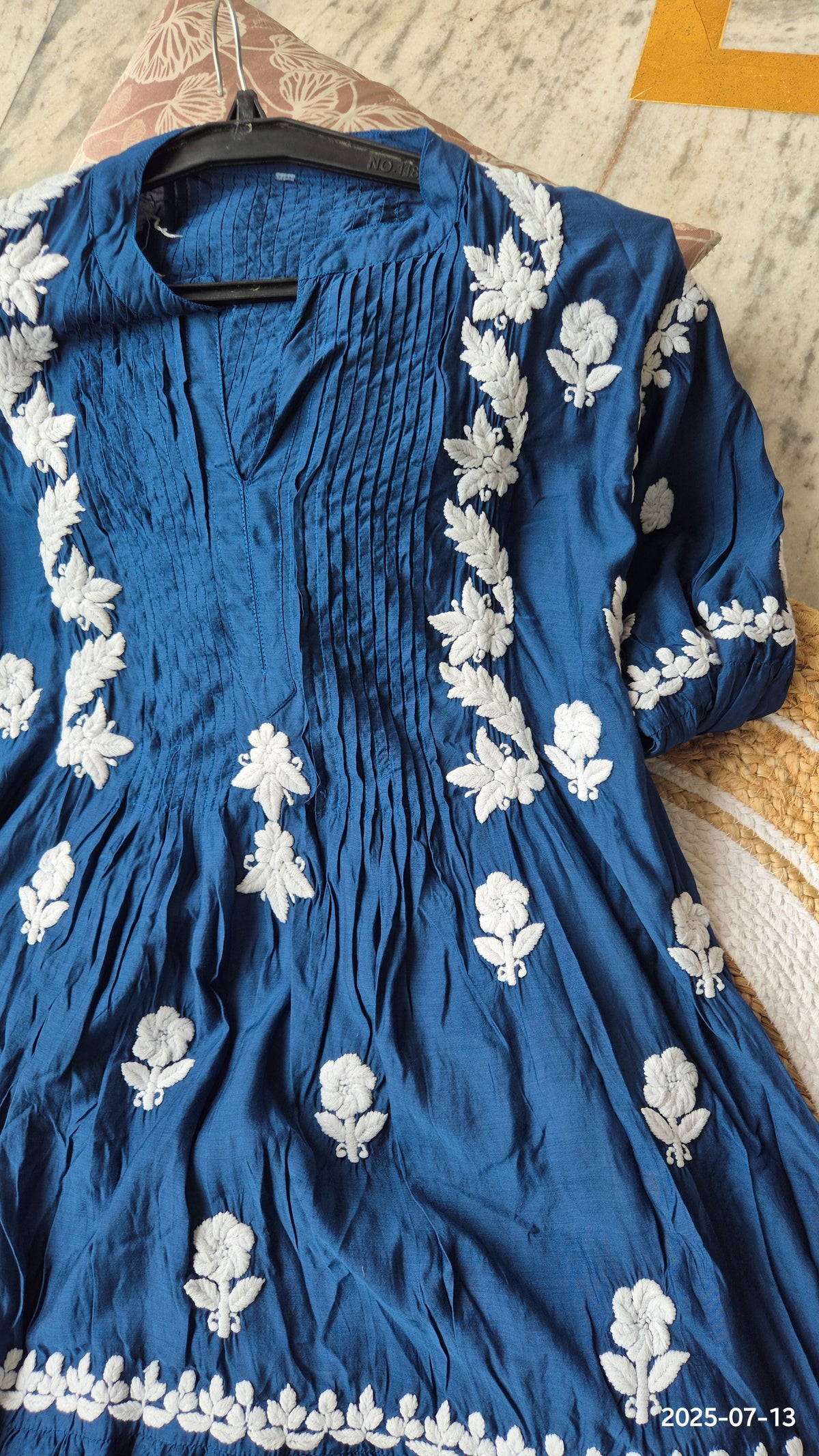 Beautiful blue midi dress by LVW Fashions featuring intricate handmade Chikankari embroidery, pure handcrafted luxurious design.