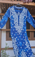 Beautiful blue shade pure mul cotton chikankari kurti for women with kamdani detailing, handmade by LVW Fashions in Lucknow style.
