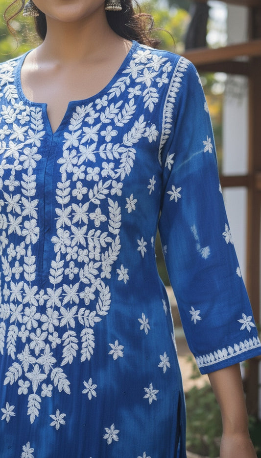 Beautiful blue shade pure mul cotton chikankari kurti for women with kamdani, handmade by LVW Fashions, features intricate Lucknow embroidery.