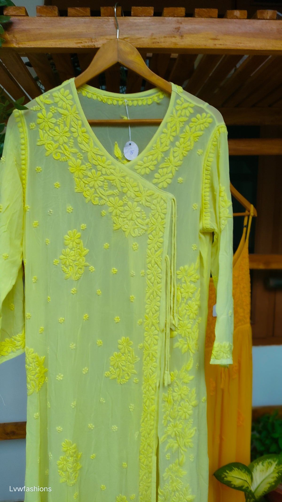 Yellow premium georgette Angrakha with intricate Lucknow Chikankari, handmade by LVW Fashions, luxurious and elegant traditional kurta.