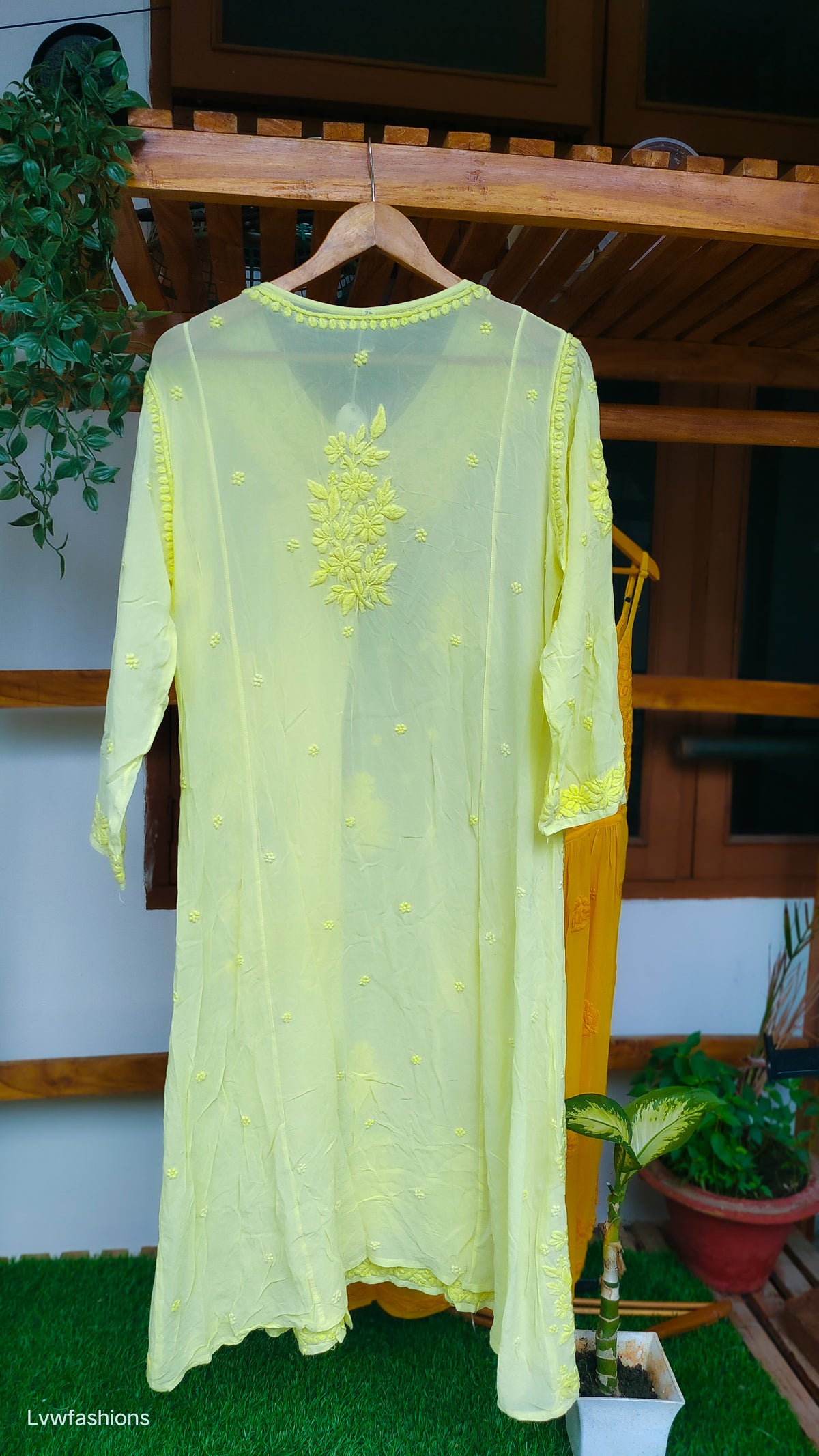 Beauty yellow premium georgette Chikankari Angrakha kurta by LVW Fashions, featuring intricate handmade Lucknow Chikankari.
