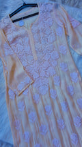 Blush luxury georgette Chikankari kurta by LVW Fashions, handcrafted with intricate Lucknow-style embroidery.