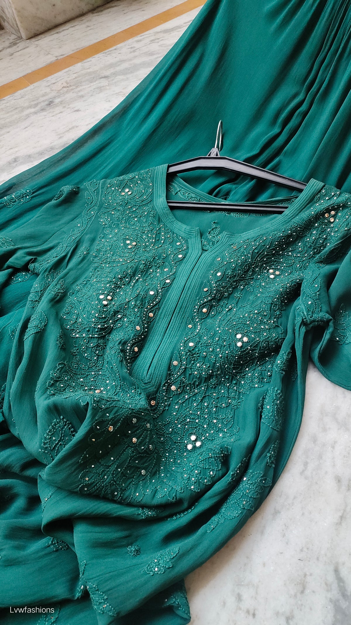 Bottle green premium georgette Chikankari sharara set with handmade Lucknow Chikankari kurta, featuring intricate embroidery and elegant design.