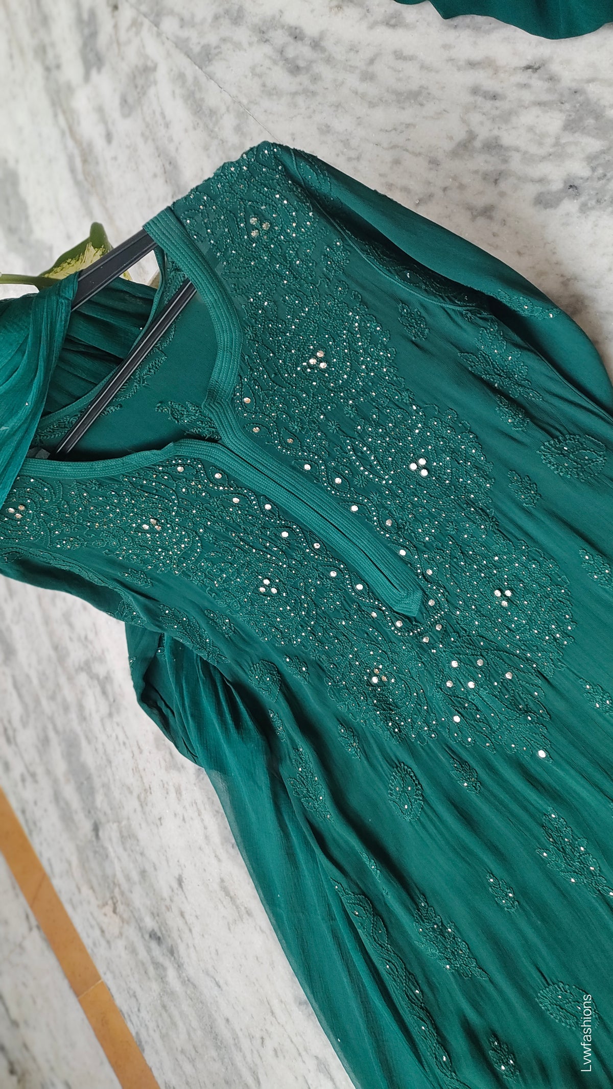 Bottle green premium georgette Chikankari sharara set with handmade Lucknow Chikankari kurta by LVW Fashions.