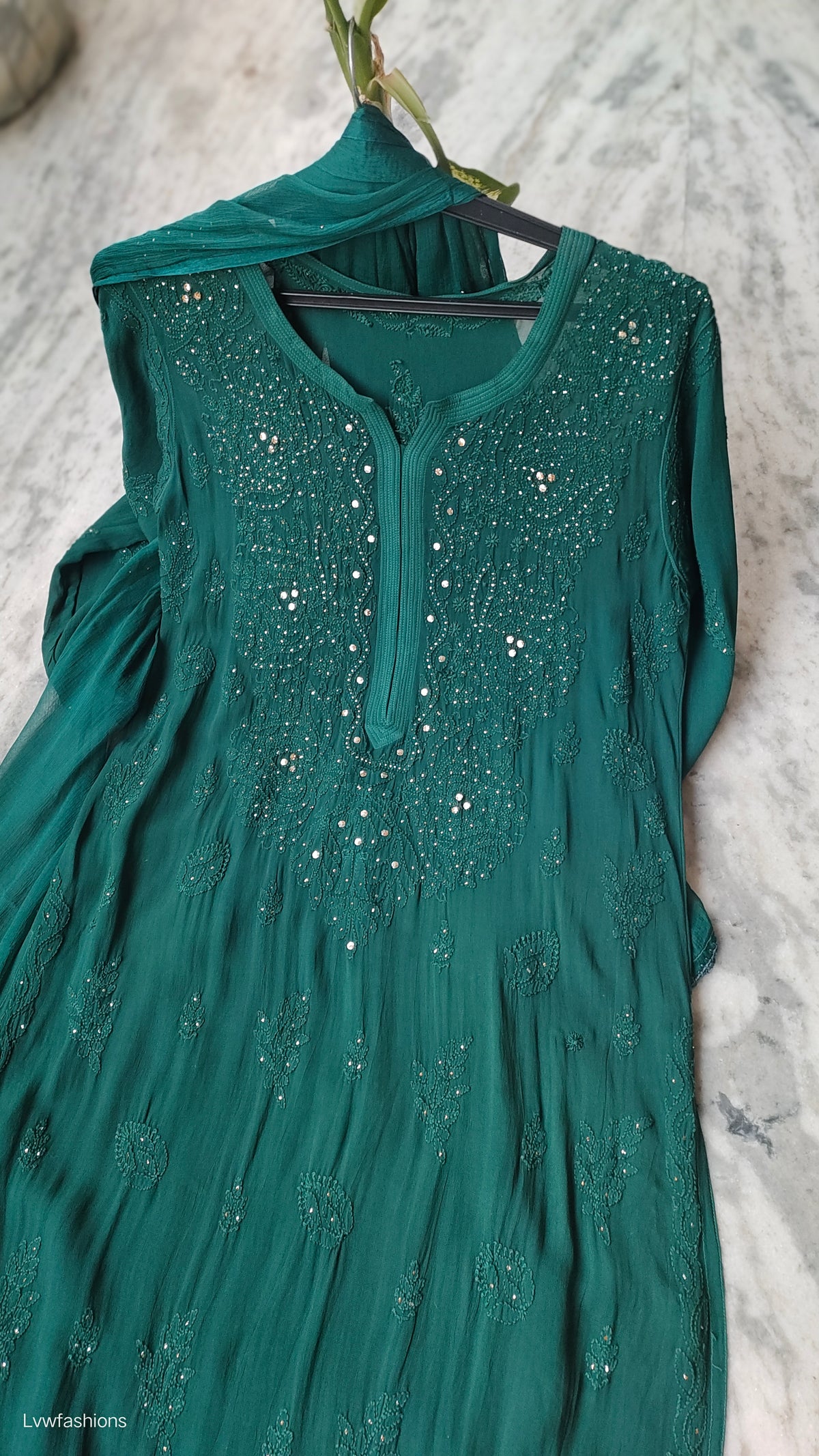 Bottle green premium georgette Chikankari Sharara set with handmade Lucknow Chikankari kurta by LVW Fashions, includes sharara and kurta.