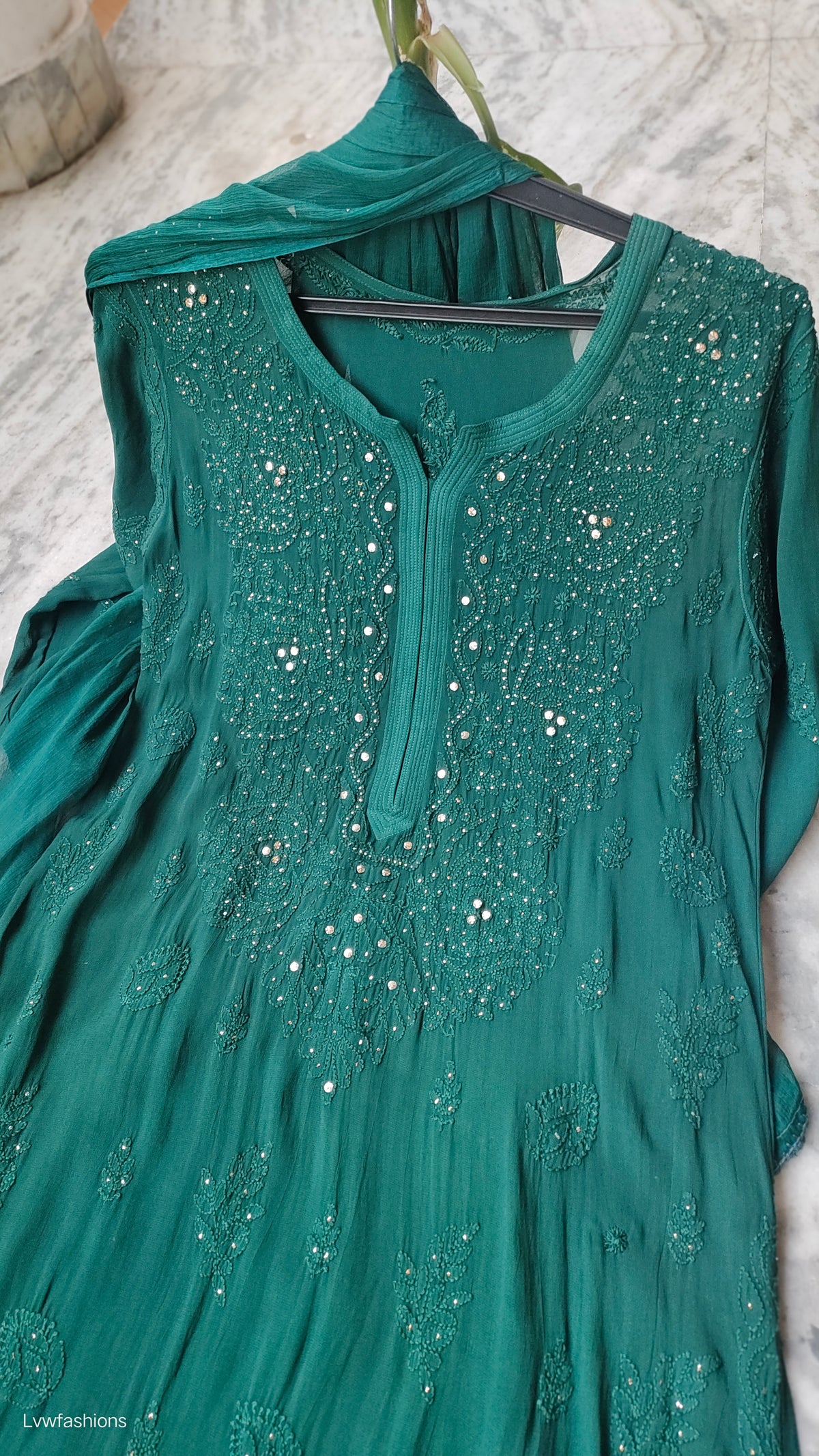 Bottle green premium georgette Chikankari sharara set with handmade Lucknow chikankari kurta, featuring intricate embroidery.