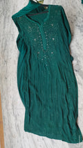 Bottle green premium georgette Chikankari sharara set with handmade Lucknow Chikankari kurta and matching sharara.