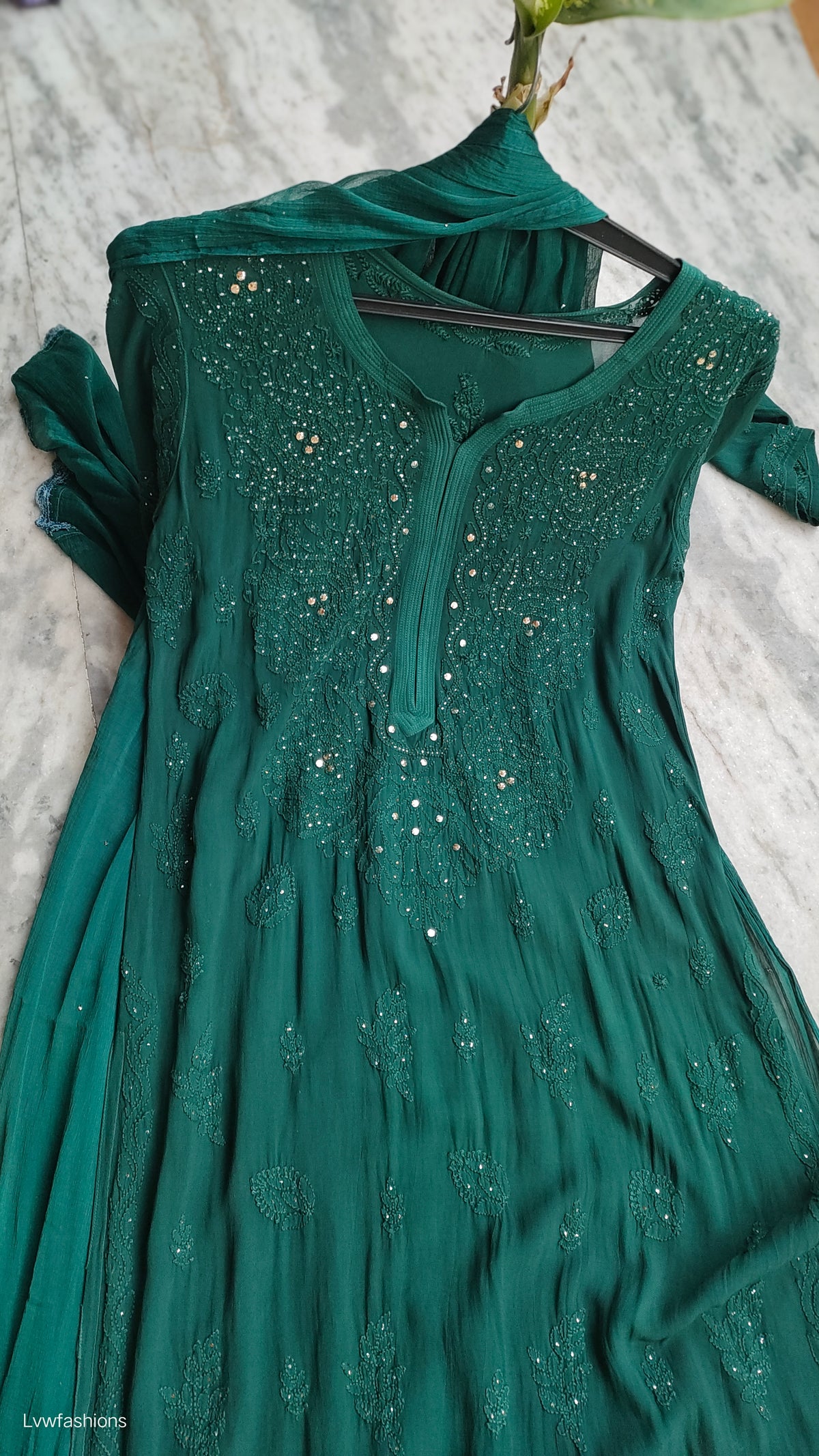 Bottle green premium georgette Chikankari sharara set with handcrafted Lucknow Chikankari kurta, designed by LVW Fashions.