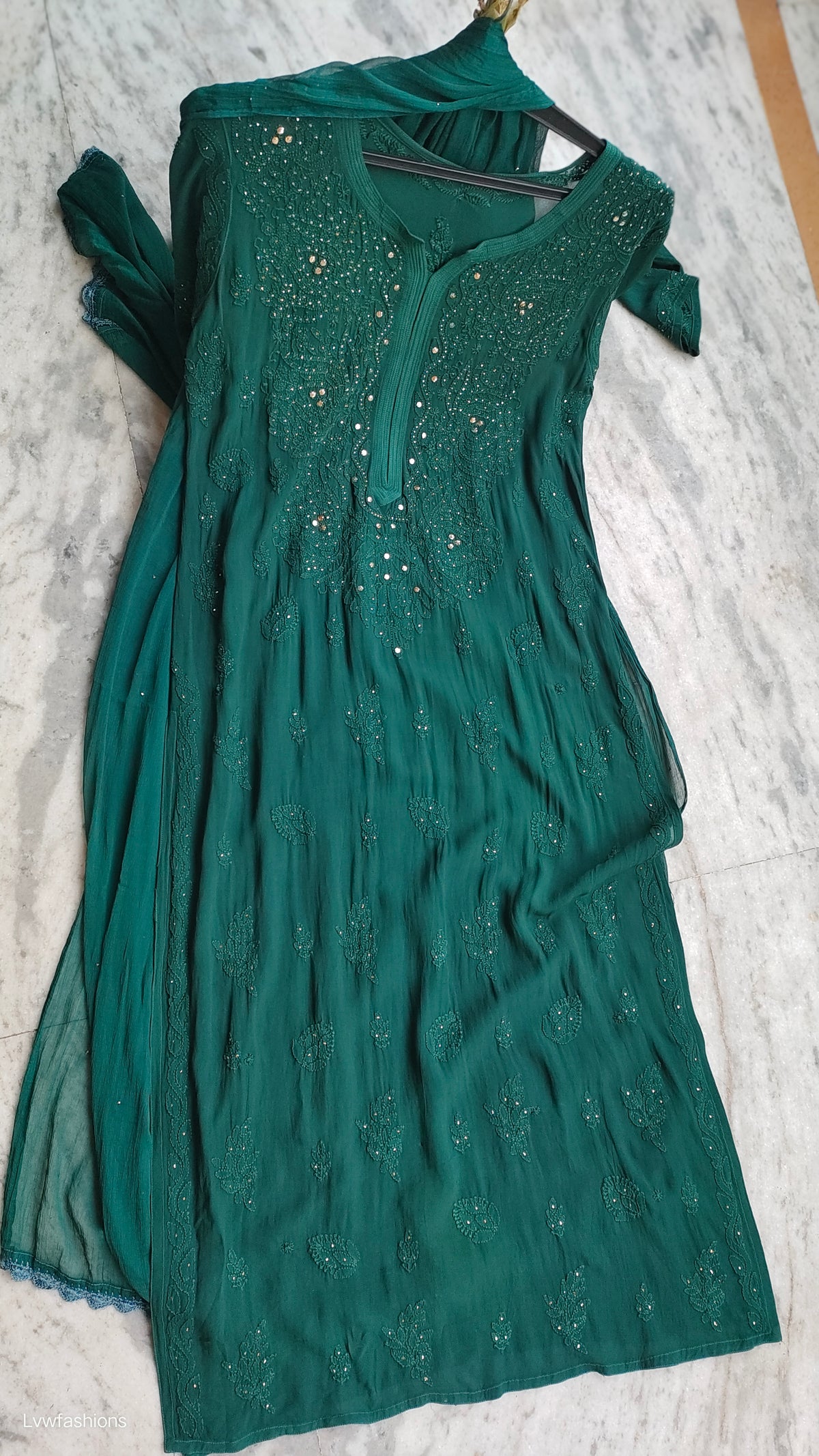 Bottle green premium georgette Chikankari sharara set with handmade Lucknow chikankari kurta and matching sharara.