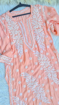 Bright peach premium soft silk long kurti with intricate handmade Lucknow chikankari embroidery by LVW Fashions.