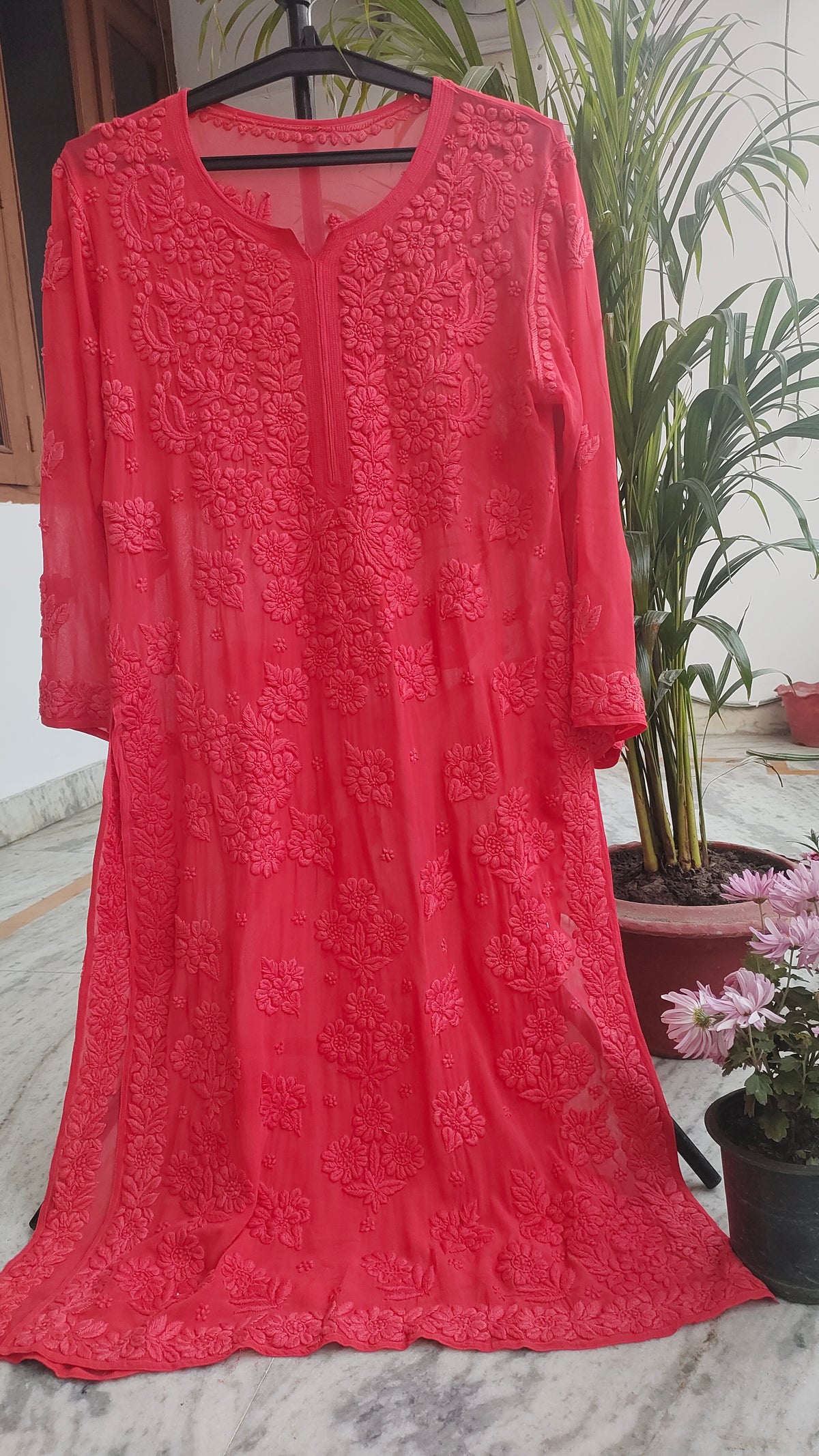 Handmade Lucknow Chikankari kurta in cardinal shade with heavy embroidery and lightweight fabric by LVW Fashions.