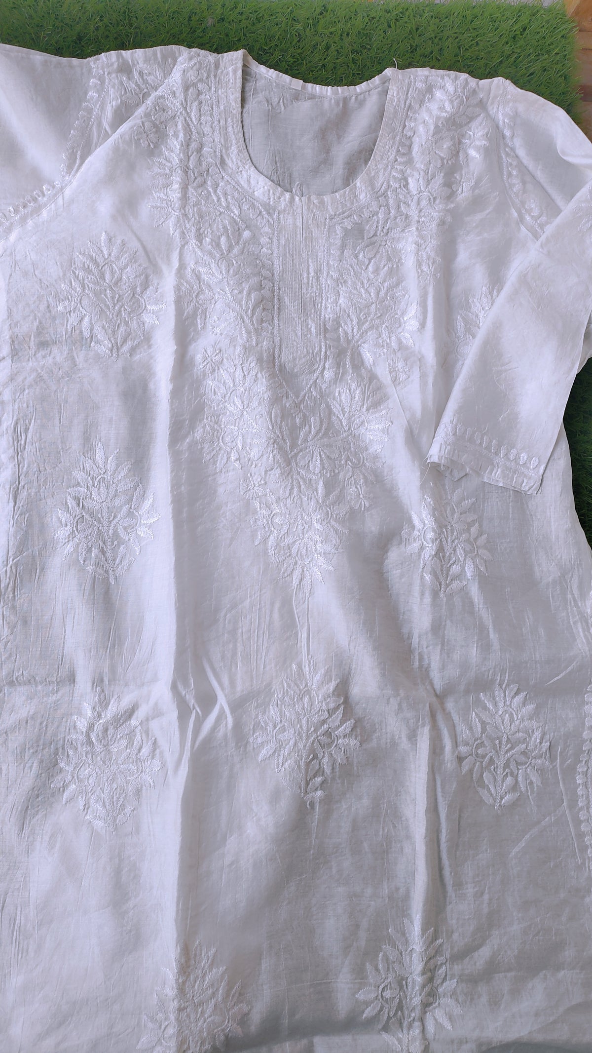 Handmade Chanderi Chikankari embroidery kurta in delicate Lucknow style, featuring intricate white embroidery on light fabric.