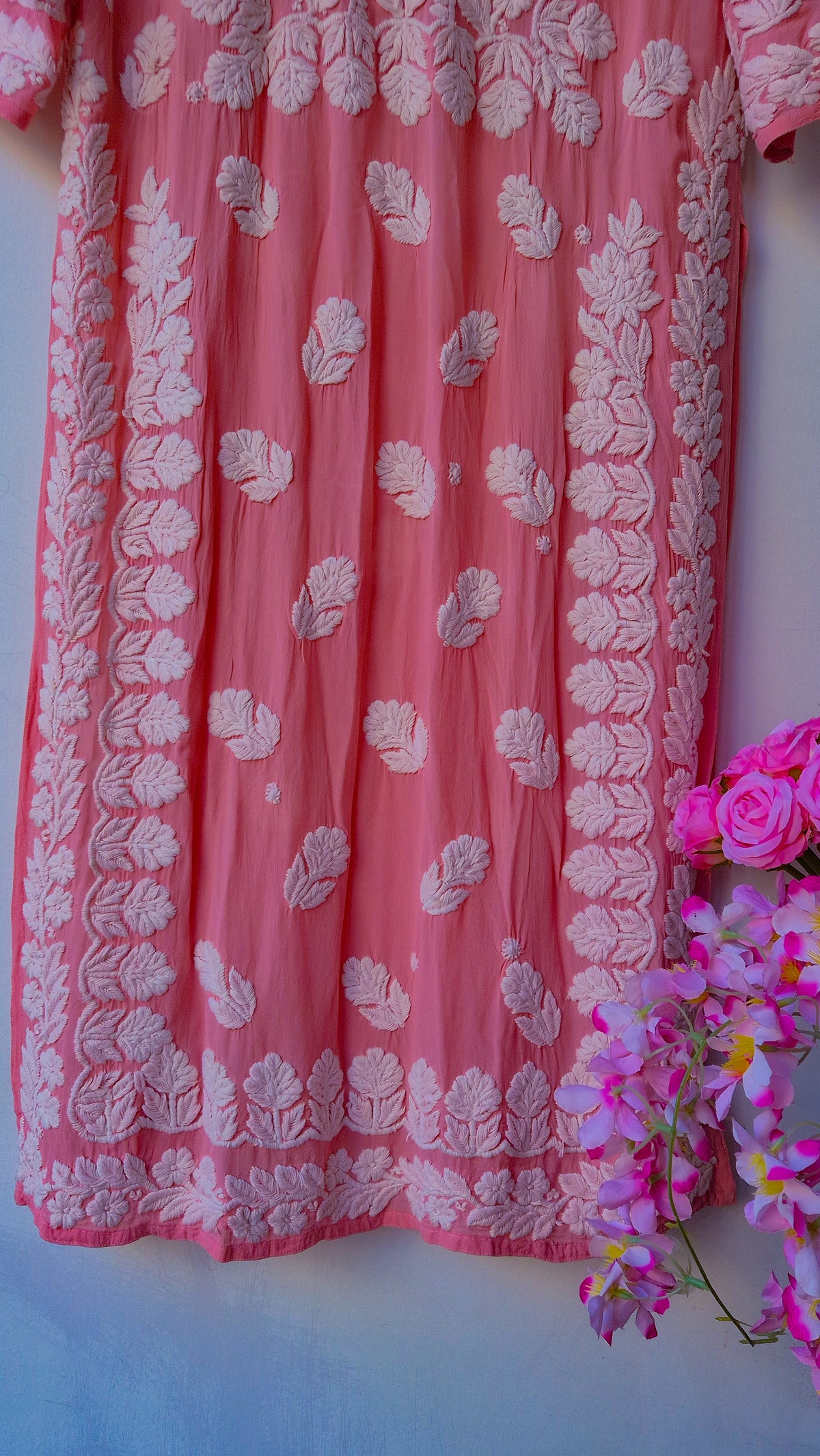 Deep puce premium georgette long kurti with intricate handmade Lucknow chikankari embroidery by LVW Fashions.