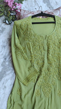Handmade green Chikankari kurta by LVW Fashions in soft cotton, featuring intricate Lucknow embroidery and long style.
