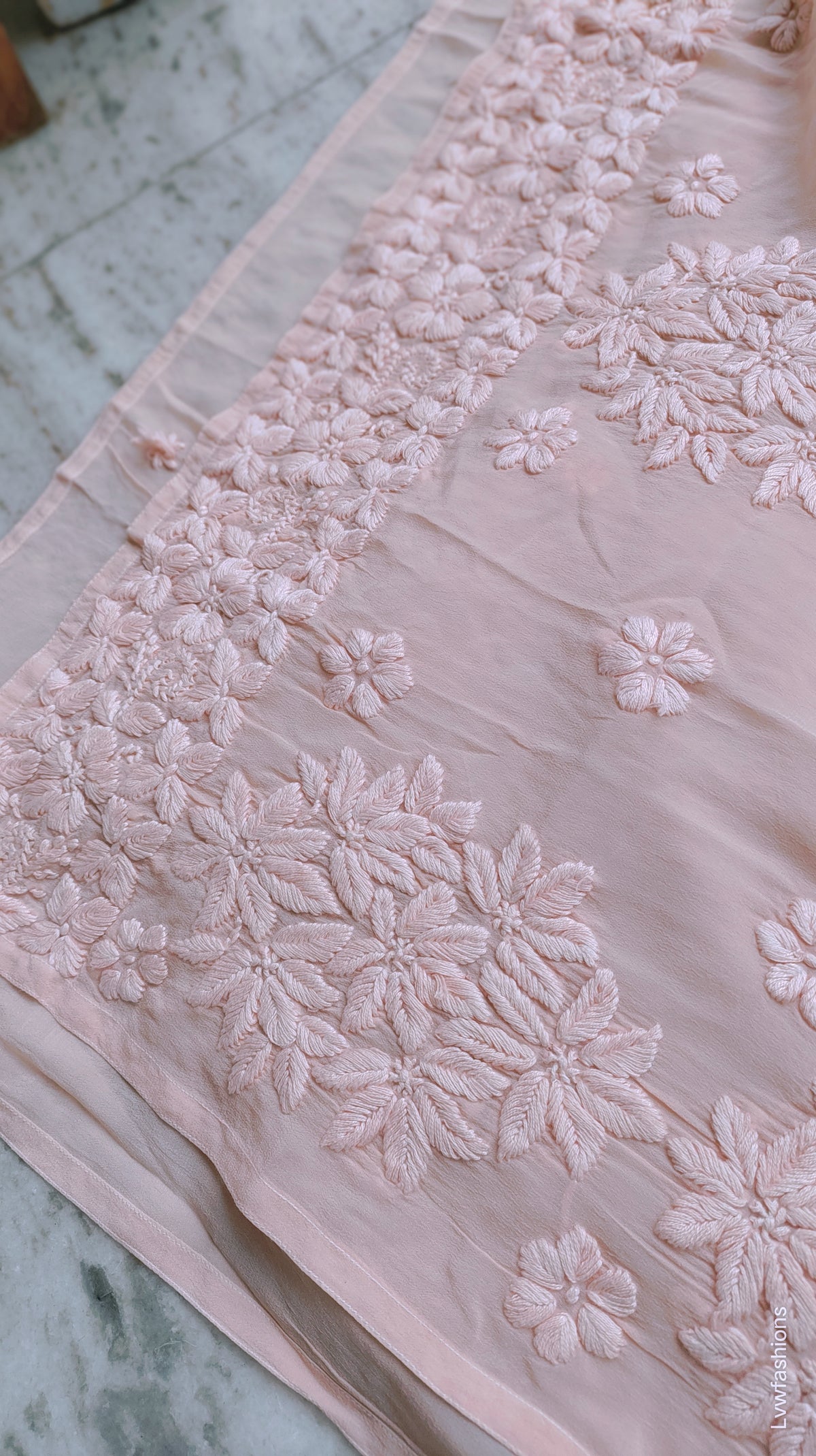 Luxurious Falak Peach silk long kurta with intricate handmade Chikankari embroidery, crafted by LVW Fashions.
