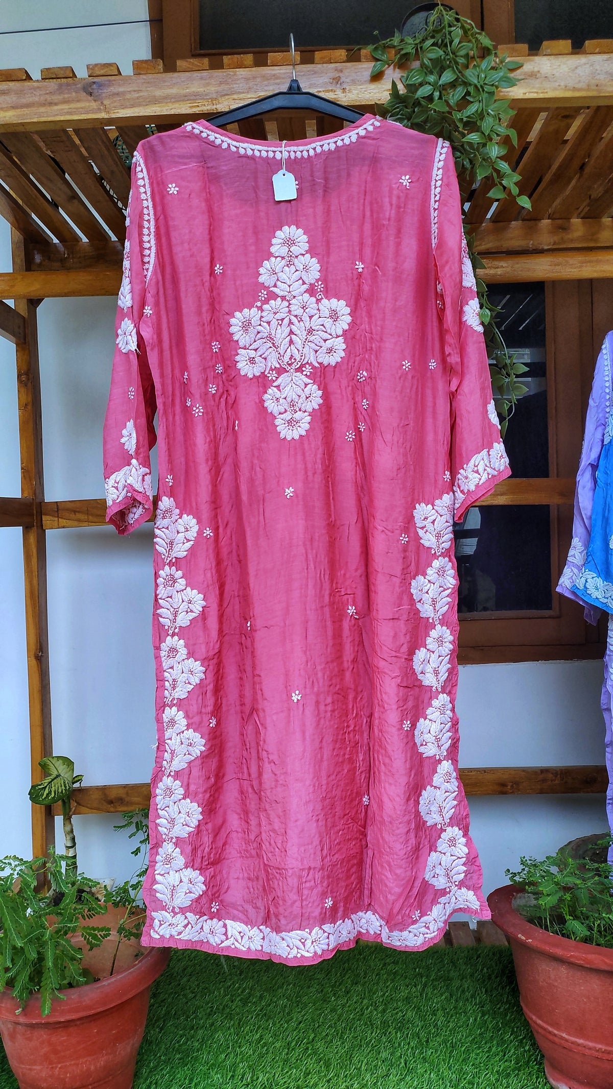 Hot pink silk long kurta by LVW Fashions with luxurious look and hand-embroidered Lucknow chikankari, featuring unique back embroidery.
