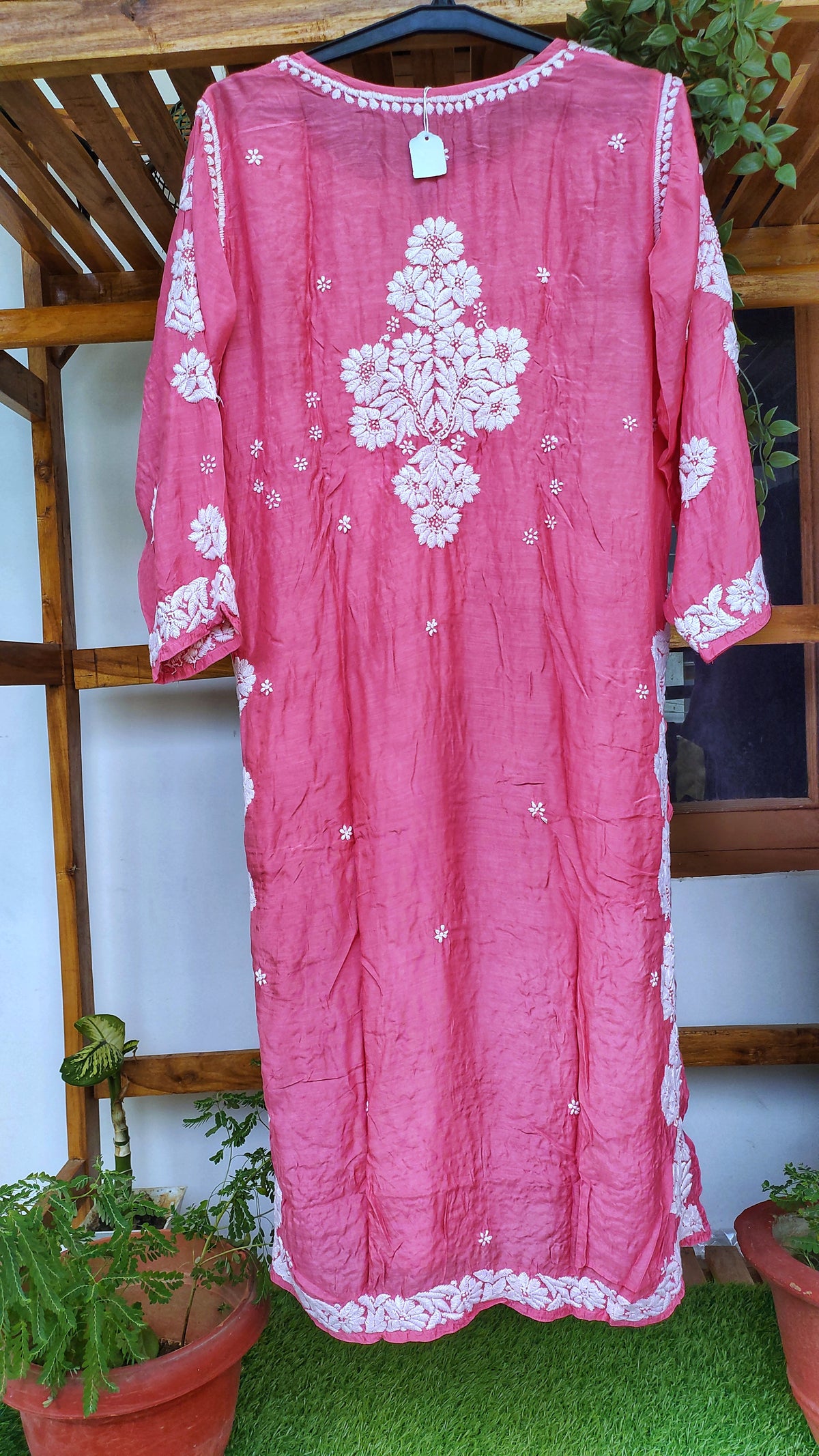 Hot pink LVW Fashions silk long kurta with intricate Lucknow Chikankari and unique back embroidery, luxurious handmade design.