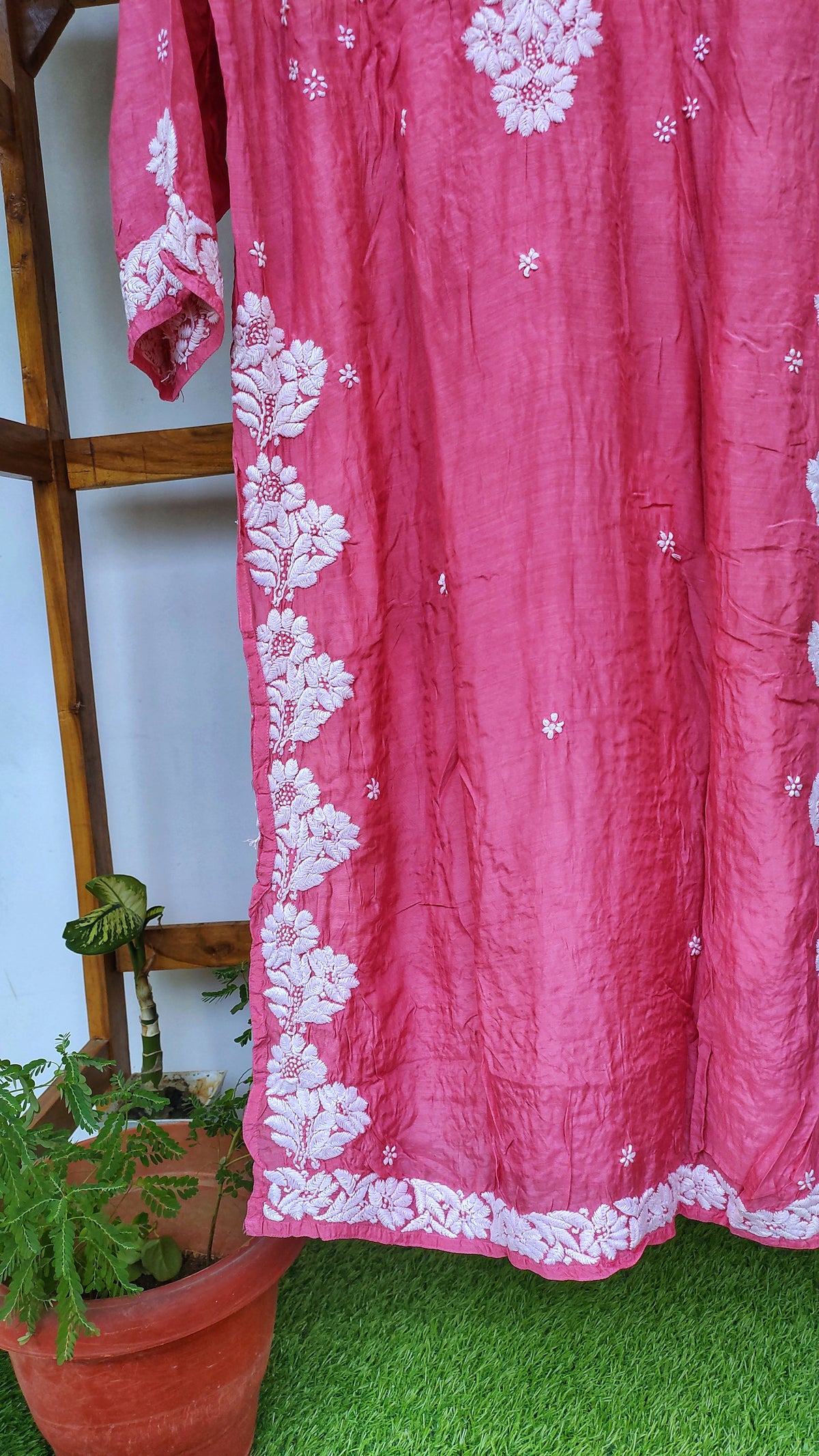 Hot pink luxury silk Kurta with intricate Lucknow Chikankari embroidery and unique back design by LVW Fashions.