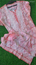 Handmade peach silk Kurta with Tye Dye and intricate Lucknow Chikankari embroidery by LVW Fashions.