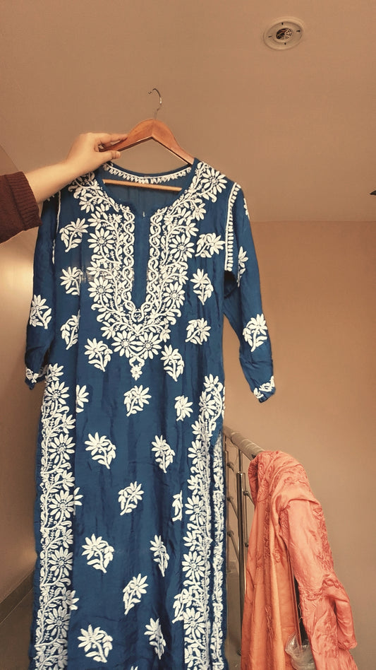 Handmade Lucknow Chikankari long kurta by LVW Fashions with transparent fabric, intricate embroidery, and a neck Daman design.