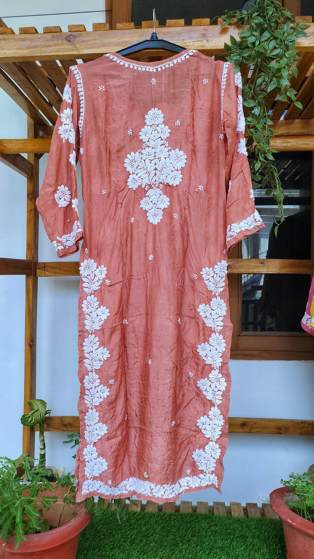Luxurious pink silk long kurta with intricate white chikankari embroidery, handmade by LVW Fashions in Lucknow.