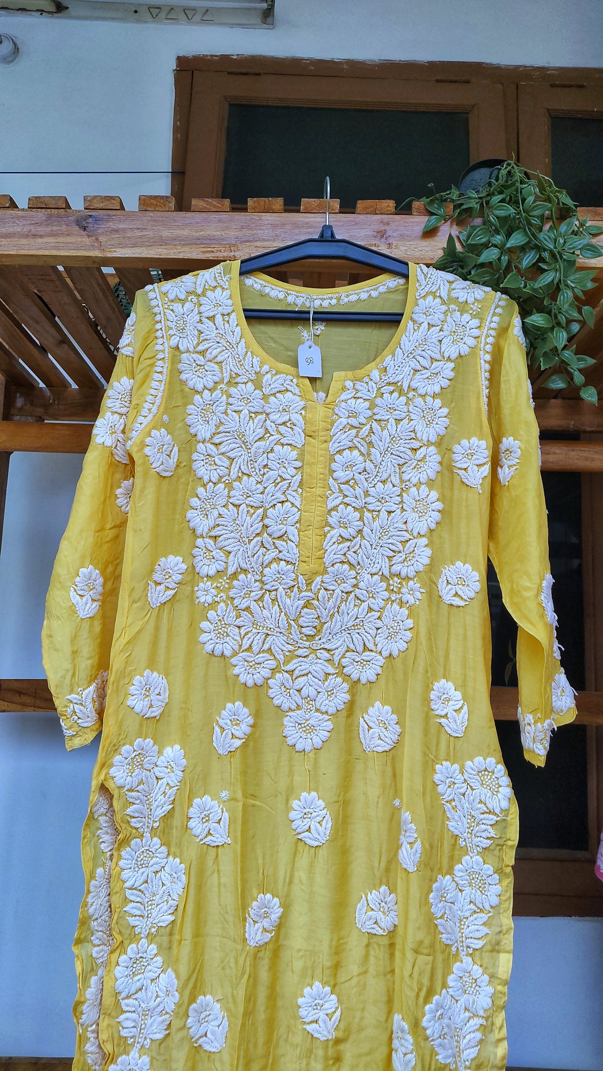 Yellow premium silk long Kurti with intricate Lucknow Chikankari and unique back embroidery from LVW Fashions.