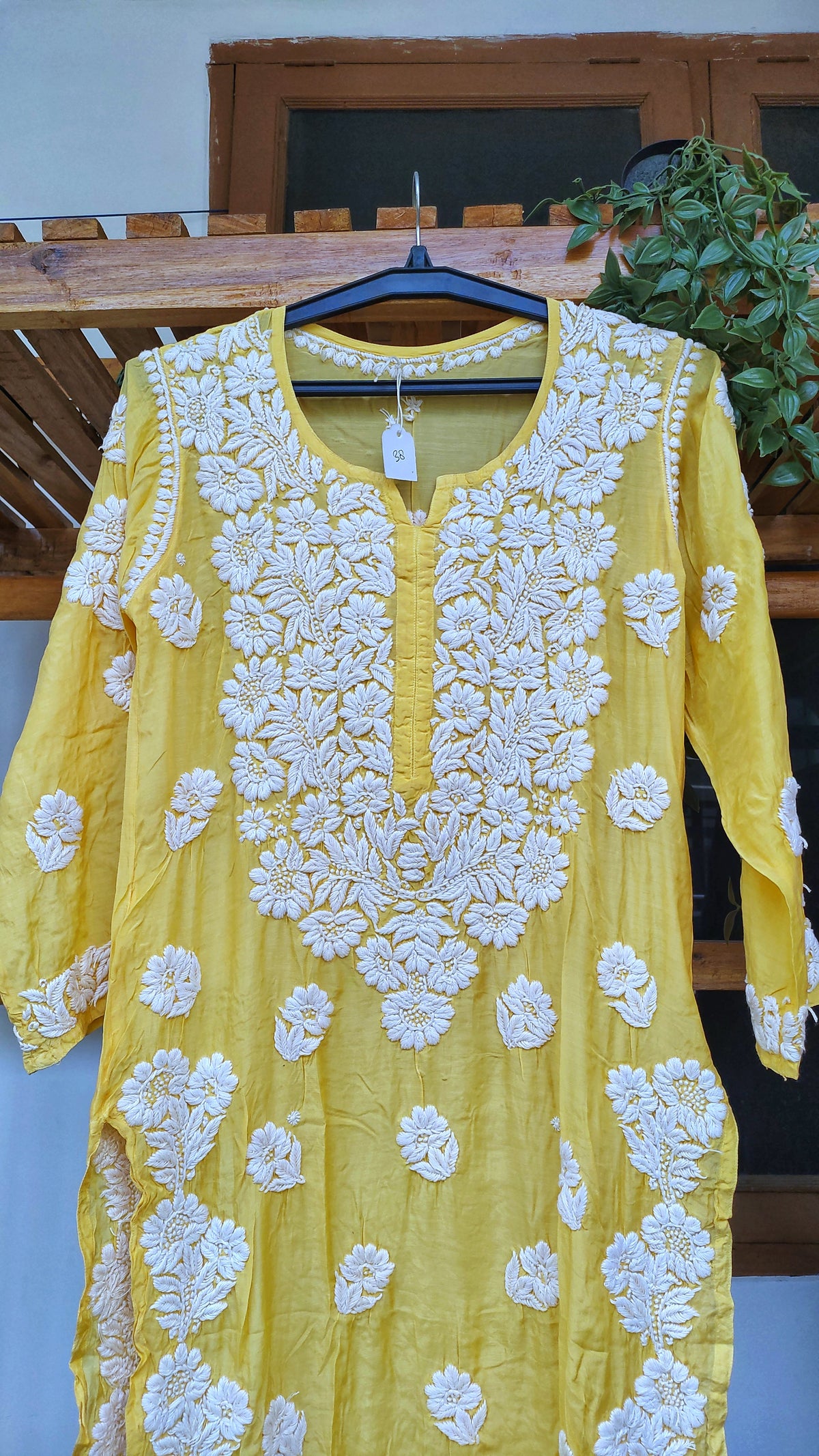 Yellow luxury silk Kurti by LVW Fashions with intricate Lucknow Chikankari and unique back embroidery, handmade long Chikankari Kurti.