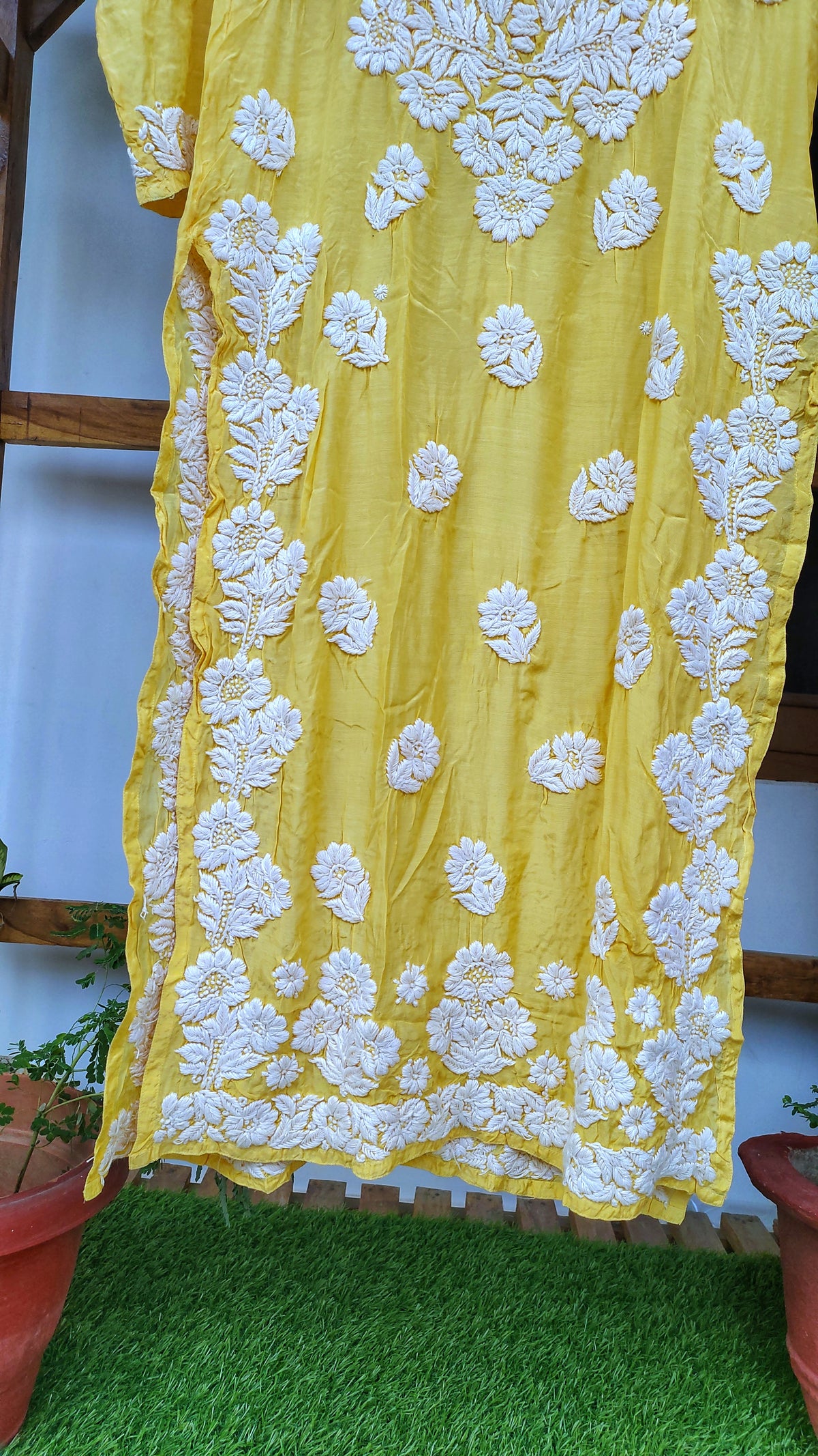 Yellow silk Chikankari long kurti by LVW Fashions with intricate back embroidery and luxurious look, handmade in Lucknow.