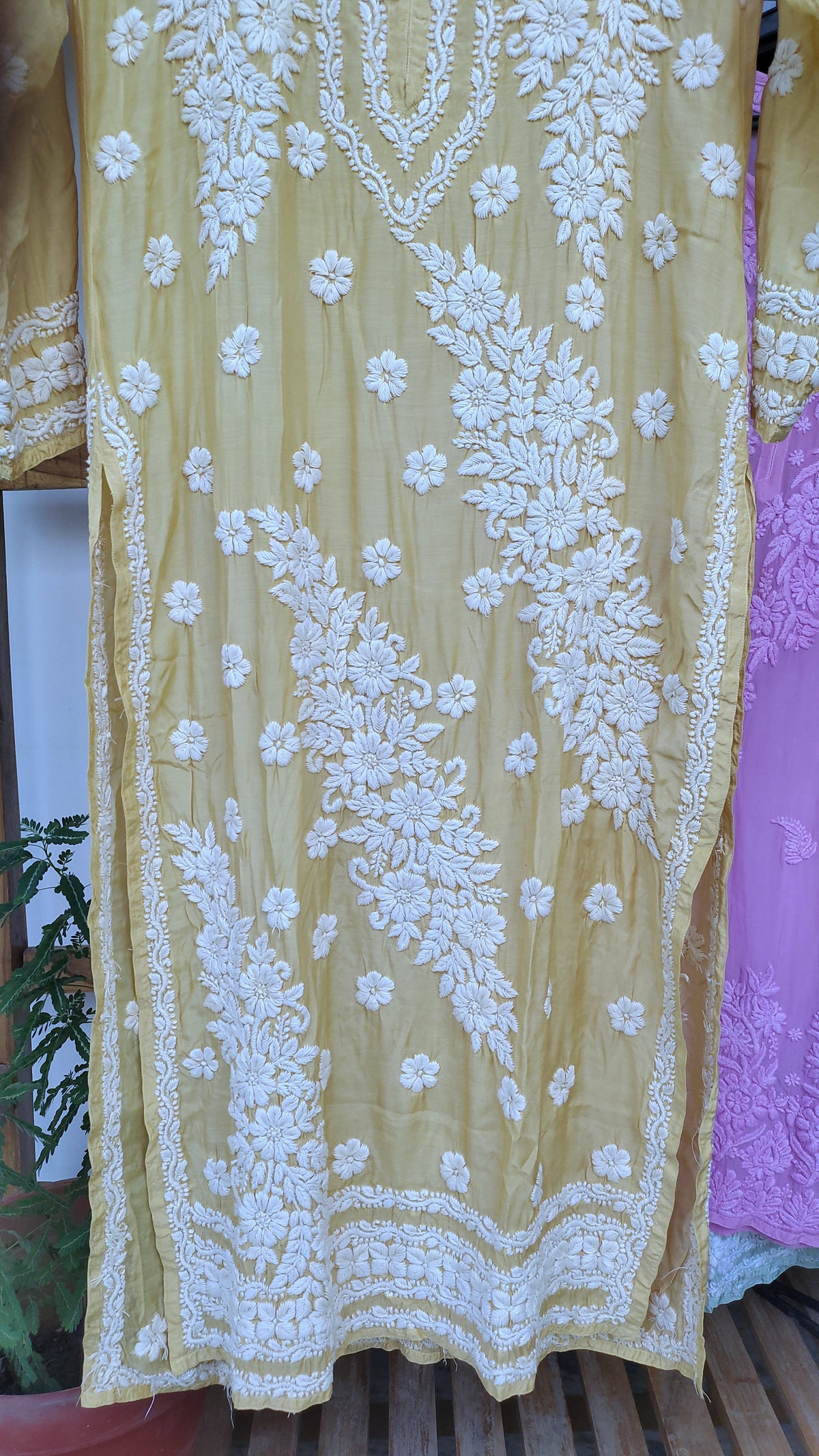 Yellow silk Feriha Flower Chikankari Kurta by LVW Fashions, featuring luxurious handmade Lucknow embroidery and elegant floral design.