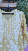 Yellow silk Feriha Flower Chikankari Kurta by LVW Fashions, featuring intricate Lucknow embroidery and a luxurious look.