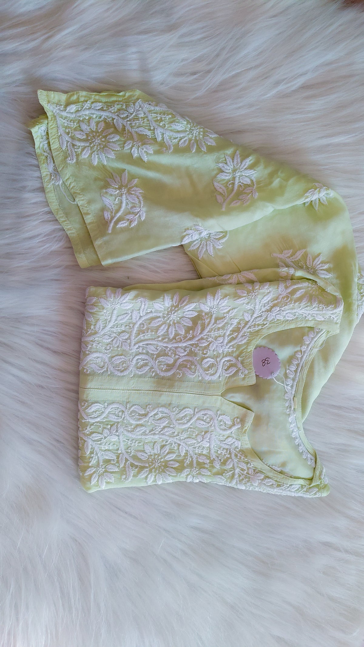Feriha Pista green cotton silk long kurta with intricate handcrafted Lucknow Chikankari embroidery by LVW Fashions.