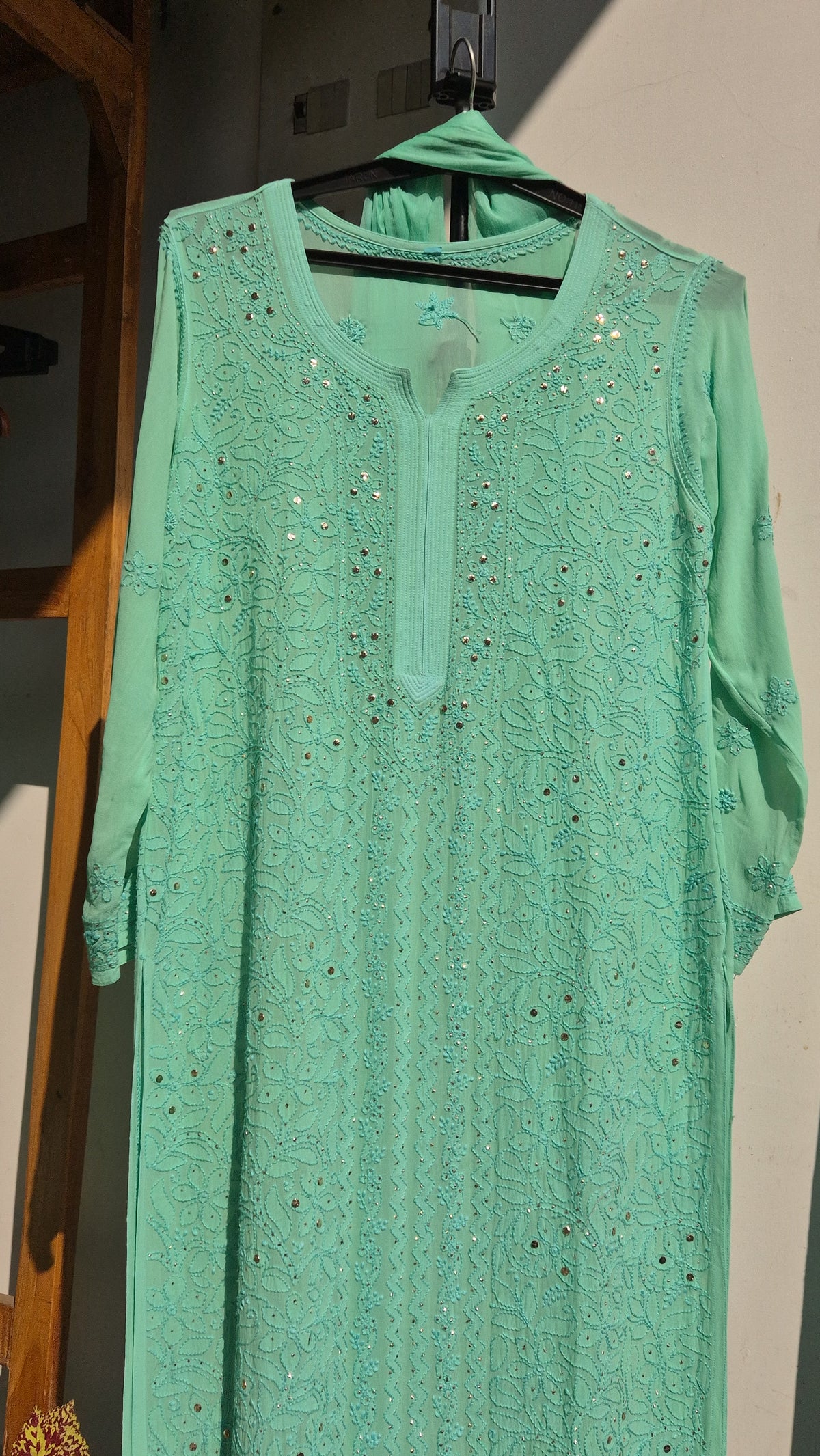 Green Sheen premium georgette Gharara set with intricate handmade Lucknow Chikankari kurta by LVW Fashions.