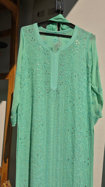 Green Sheen premium georgette Gharara set with intricate handmade Lucknow Chikankari kurta by LVW Fashions.