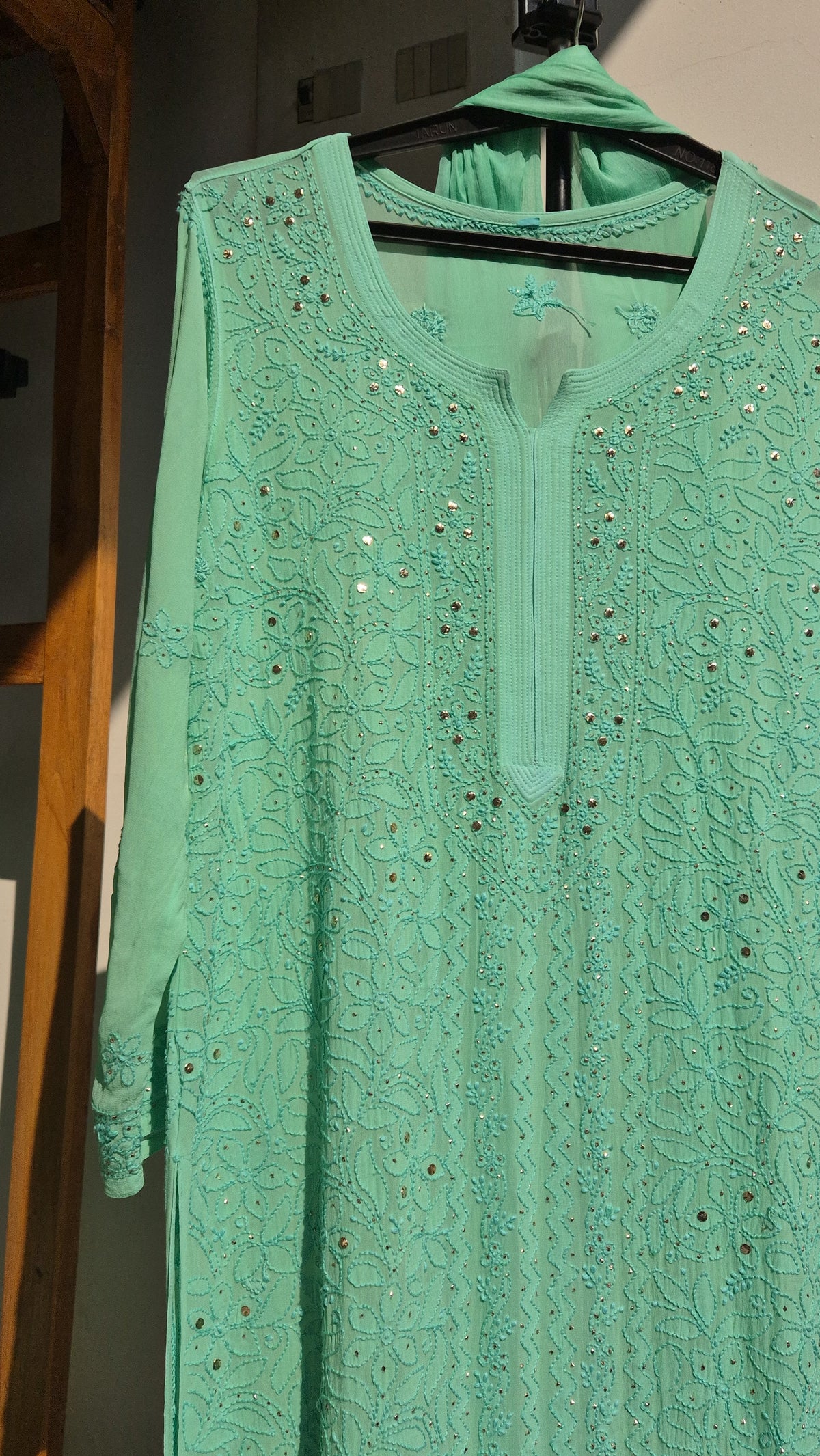 Green Sheen premium georgette Gharara set with intricate handmade Lucknow Chikankari kurta and luxurious details by LVW Fashions.