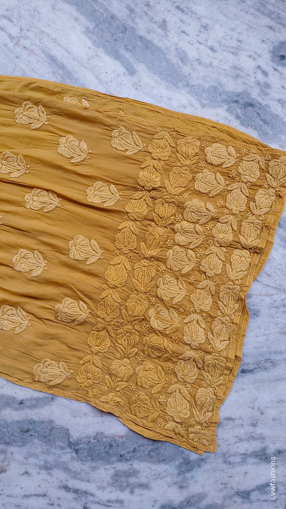 Handmade Hania Turmaric premium silk Chikankari kurta with heavy daman, crafted by LVW Fashions in Lucknow Chikankari style.