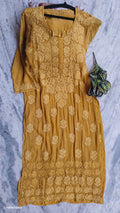 Hania Turmaric premium silk Chikankari Kurta with heavy daman embroidery, handmade by LVW Fashions in Lucknow Chikankari style.