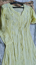 Heer lemon yellow premium georgette long kurta with intricate handmade Lucknow chikankari embroidery by LVW Fashions.