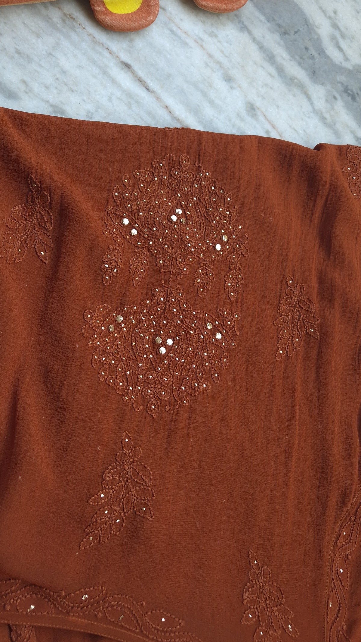 Hershey Kiss premium georgette long Kurti set with handmade Lucknow Chikankari, featuring neck bootas and intricate embroidery.