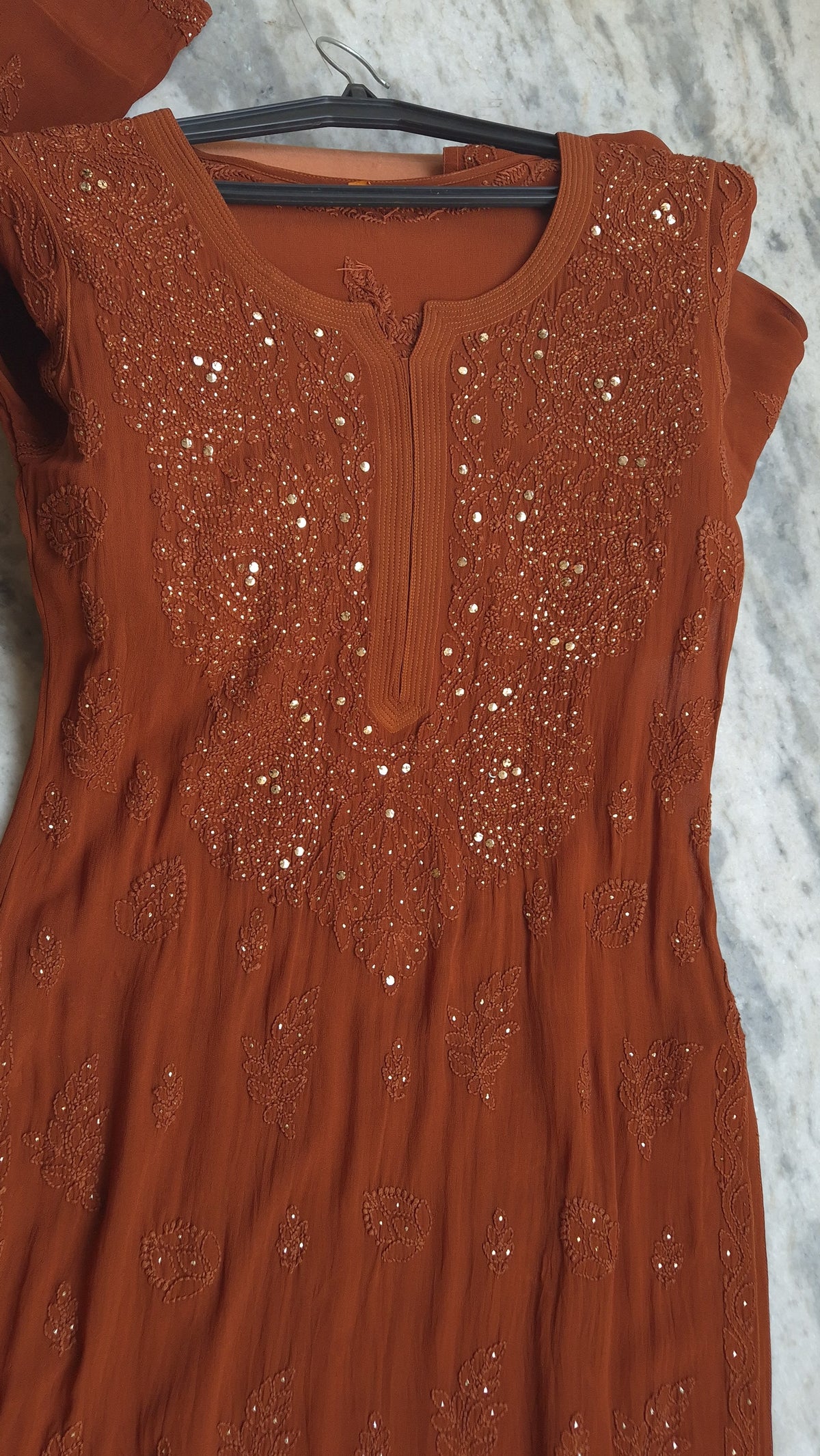 Hershey Kiss premium georgette long kurti set with handmade Lucknow chikankari, featuring intricate neck and Bootas embroidery.