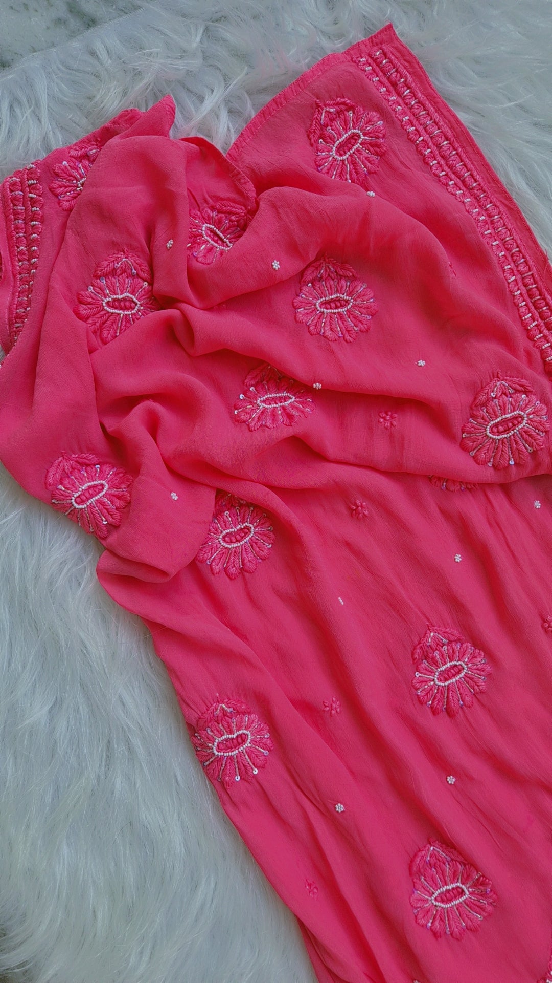 Hot pink Noori premium georgette Chikankari kurta by LVW Fashions with intricate cutdana embroidery, handmade in Lucknow.