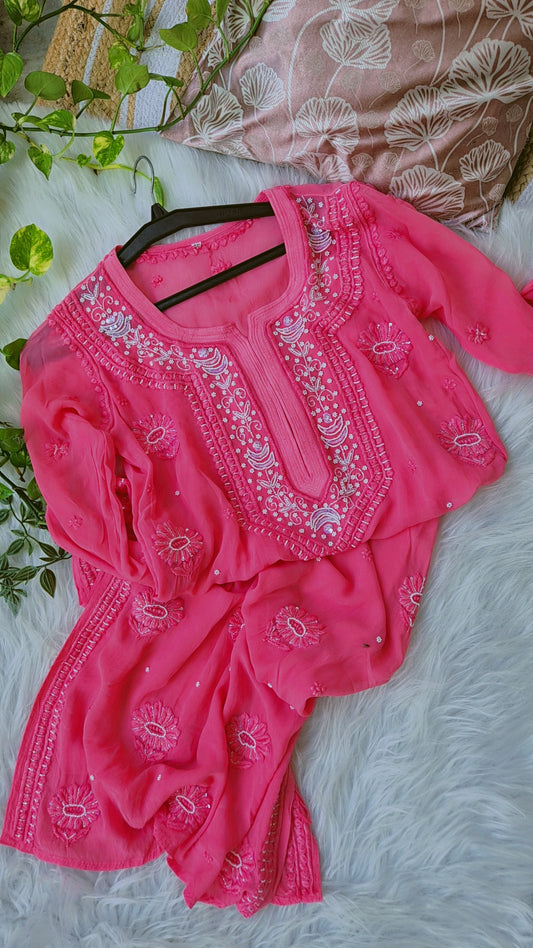 Hot pink Noori premium georgette Chikankari kurta with handmade Lucknow cutdana embroidery and intricate chikankari details.